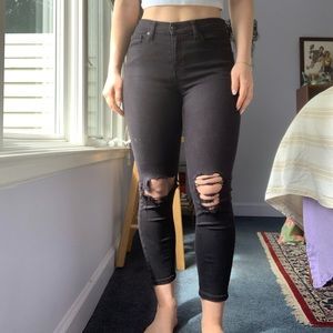 Topshop Petite ripped Jamie skinny jeans in black
